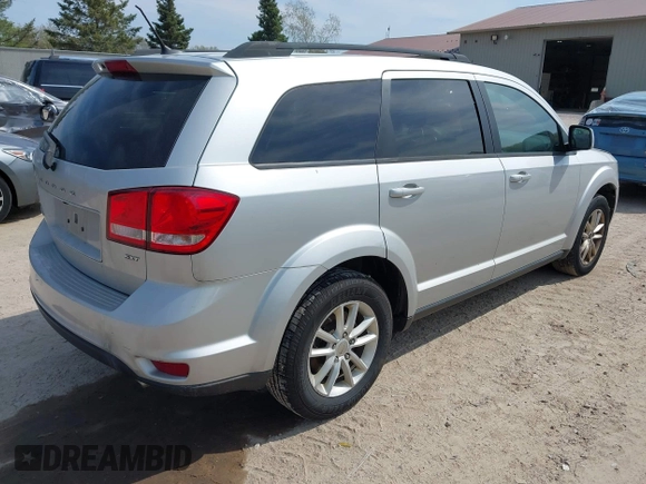 2014 Dodge Journey SXT z VIN 3C4PDDBG8ET155636, wystawiony jako IAAI lot #42215777 z przebiegiem 193 708 mil mil oraz . Historia ofert i sprzedaży dostępna na DreamBid. Obrazek 4.