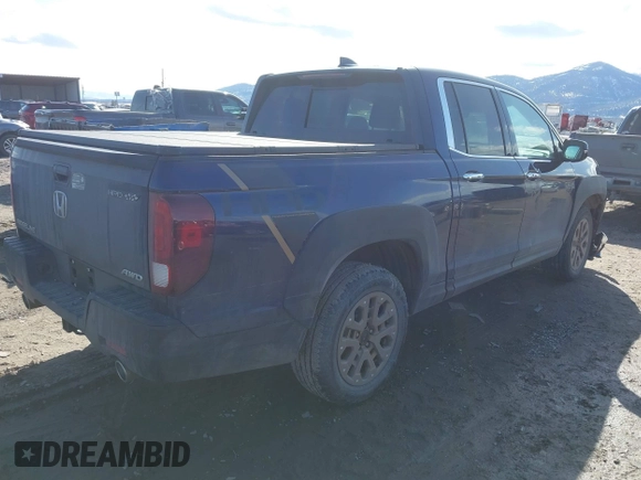 2022 Honda Ridgeline RTL-E with VIN 5FPYK3F71NB013522, listed as a IAAI auction lot 41670347 with 24,689 mi miles and . Bid and sale history available at DreamBid. Image 4.