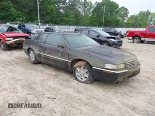 1997 Cadillac Eldorado ESC with VIN 1G6EL12Y8VU617784, listed as a IAAI auction lot 42214333 with Not Provided miles and . Bid and sale history available at DreamBid. Image 1.