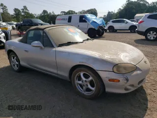 2001 Mazda MX-5 Miata with VIN JM1NB353510205710, listed as a Copart auction lot 59623015 with Not provided miles and Clean title. Bid and sale history available at DreamBid. Image 4.