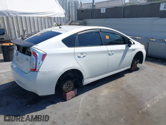 2015 Toyota Prius Four with VIN JTDKN3DU8F1984106, listed as a IAAI auction lot 42676087 with 54,956 mi miles and . Bid and sale history available at DreamBid. Image 4.