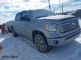 2014 Toyota Tundra 4WD Truck Platinum with VIN 5TFAW5F19EX376789, listed as a IAAI auction lot 41336393 with 138,044 mi miles. Bid and sale history available at carsss.com. Image 1.