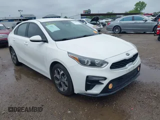 2021 Kia Forte LXS z VIN 3KPF24AD2ME320947, wystawiony jako IAAI lot #42128739 z przebiegiem 94 229 mil mil oraz . Historia ofert i sprzedaży dostępna na DreamBid. Obrazek 1.