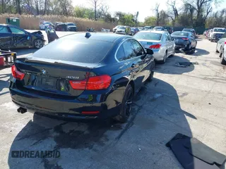 2016 BMW 4 Series 428i xDrive with VIN WBA4C9C53GG135945, listed as a IAAI auction lot 41964691 with 93,273 mi miles and . Bid and sale history available at carsss.com. Image 4.