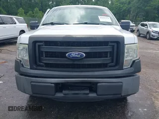 2014 Ford F-150 XL with VIN 1FTMF1CM1EKG31209, listed as a IAAI auction lot 42105573 with 187,162 mi miles and . Bid and sale history available at DreamBid. Image 12.
