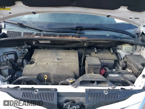 2015 Toyota Sienna LE AAS with VIN 5TDKK3DC2FS590667, listed as a IAAI auction lot 41997673 with 169,828 mi miles. Bid and sale history available at carsss.com. Image 10.