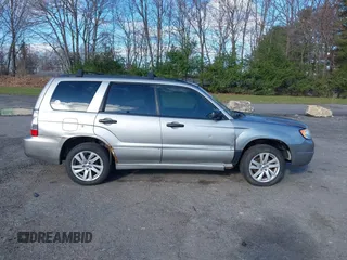 2007 Subaru Forester X with VIN JF1SG63627H747415, listed as a IAAI auction lot 42051221 with 200,763 mi miles. Bid and sale history available at carsss.com. Image 14.