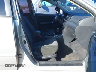 2003 Toyota Corolla CE with VIN 1NXBR32E13Z042694, listed as a IAAI auction lot 41497871 with 210,883 mi miles and . Bid and sale history available at DreamBid. Image 5.