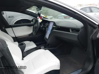 2018 Tesla Model S 75D with VIN 5YJSA1E24JF259874, listed as a IAAI auction lot 41921382 with 82,182 mi miles and . Bid and sale history available at DreamBid. Image 5.