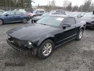 2007 Ford Mustang Deluxe with VIN 1ZVFT80N275285564, listed as a IAAI auction lot 41980104 with 111,665 mi miles. Bid and sale history available at carsss.com. Image 2.