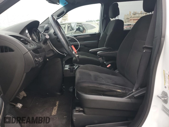 2015 Dodge Grand Caravan American Value with VIN 2C4RDGBG0FR636219, listed as a Copart auction lot 54527235 with 95,175 mi miles and Salvage Title. Bid and sale history available at DreamBid. Image 7.
