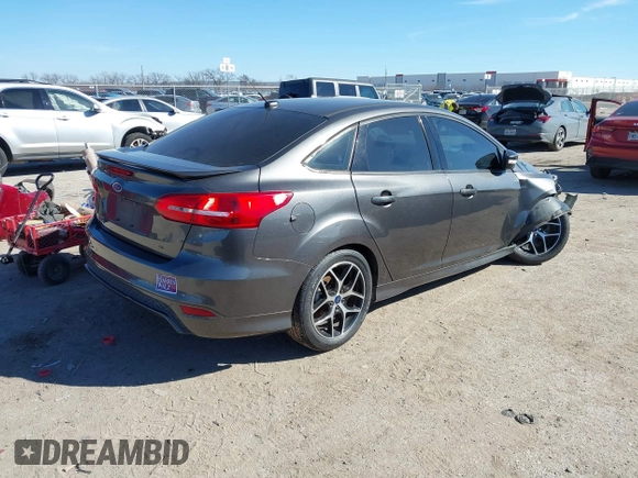 2016 Ford Focus SE with VIN 1FADP3F21GL262907, listed as a IAAI auction lot 41657582 with 62,789 mi miles. Bid and sale history available at carsss.com. Image 4.