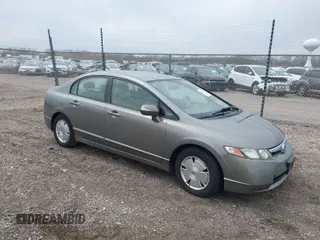 2006 Honda Civic z VIN JHMFA36286S006142, wystawiony jako IAAI lot #42002933 z przebiegiem 135 182 mil mil oraz . Historia ofert i sprzedaży dostępna na DreamBid. Obrazek 1.
