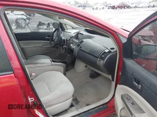 2007 Toyota Prius z VIN JTDKB20U977687630, wystawiony jako IAAI lot #41939185 z przebiegiem 392 988 mil mil oraz . Historia ofert i sprzedaży dostępna na DreamBid. Obrazek 5.