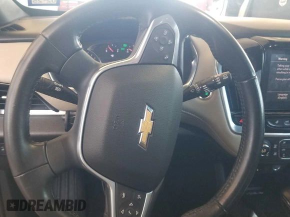 2022 Chevrolet Traverse LT Cloth z VIN 1GNERGKW0NJ146381, wystawiony jako IAAI lot #42558331 z przebiegiem 79 527 mil mil oraz . Historia ofert i sprzedaży dostępna na DreamBid. Obrazek 16.