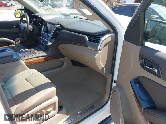2020 Chevrolet Suburban Premier with VIN 1GNSCJKC9LR125292, listed as a IAAI auction lot 42073858 with 92,363 mi miles and . Bid and sale history available at DreamBid. Image 5.