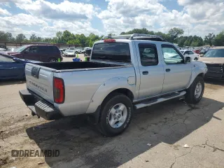 2001 Nissan Frontier SE with VIN 1N6ED27T51C311894, listed as a Copart auction lot 56281465 with 151,361 mi miles and Salvage title. Bid and sale history available at DreamBid. Image 3.