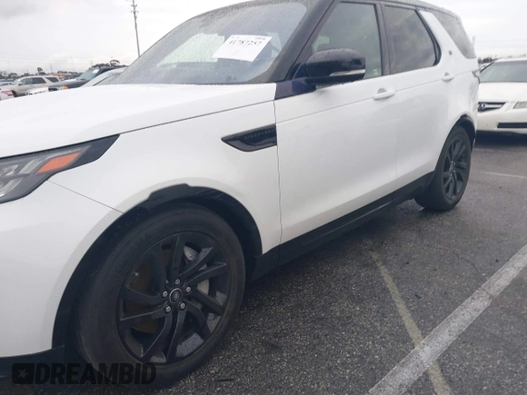 2018 Land Rover Discovery HSE z VIN SALRR2RV1JA078394, wystawiony jako IAAI lot #41787257 z przebiegiem 74 499 mil mil oraz . Historia ofert i sprzedaży dostępna na DreamBid. Obrazek 6.