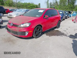 2012 Volkswagen GTI w/Conv & Sunroof z VIN WVWEV7AJ2CW259338, wystawiony jako IAAI lot #42123333 z przebiegiem 121 365 mil mil oraz . Historia ofert i sprzedaży dostępna na DreamBid. Obrazek 2.