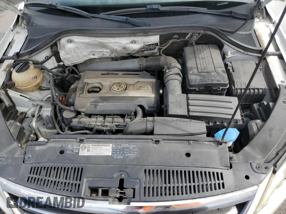 2010 Volkswagen Tiguan Wolfsburg Edition with VIN WVGAV7AX7AW003188, listed as a Copart auction lot 56692535 with 121,502 mi miles and Salvage title. Bid and sale history available at DreamBid. Image 12.