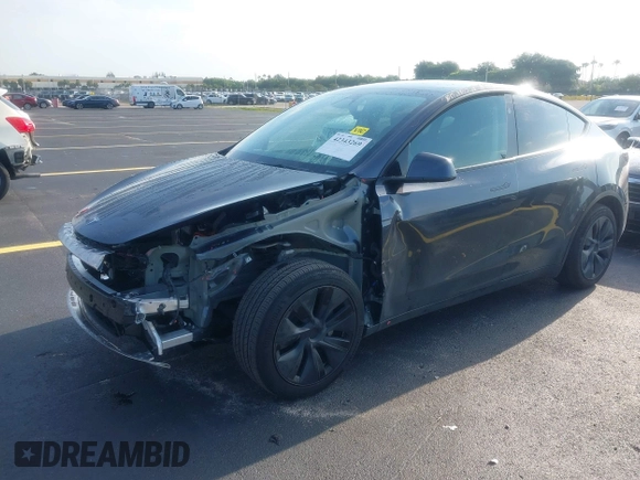 2024 Tesla Model Y with VIN 7SAYGDED3RA329355, listed as a IAAI auction lot 42343269 with 8,334 mi miles and . Bid and sale history available at DreamBid. Image 18.