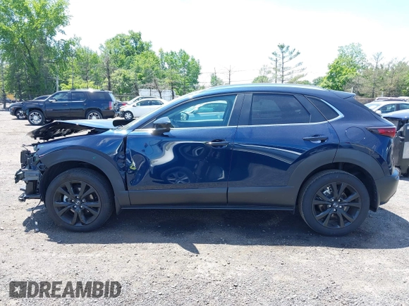 2024 Mazda CX-30 S Select Sport with VIN 3MVDMBBM2RM657781, listed as a IAAI auction lot 42297311 with 13,677 mi miles and . Bid and sale history available at DreamBid. Image 14.