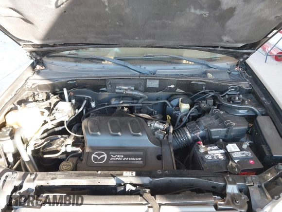 2002 Mazda Tribute LX with VIN 4F2CU08172KM58561, listed as a IAAI auction lot 41435407 with 141,908 mi miles and . Bid and sale history available at carsss.com. Image 10.