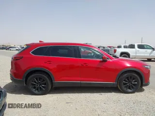2016 Mazda CX-9 Touring z VIN JM3TCACY9G0102524, wystawiony jako IAAI lot #42305452 z przebiegiem 76 892 mil mil oraz . Historia ofert i sprzedaży dostępna na DreamBid. Obrazek 13.