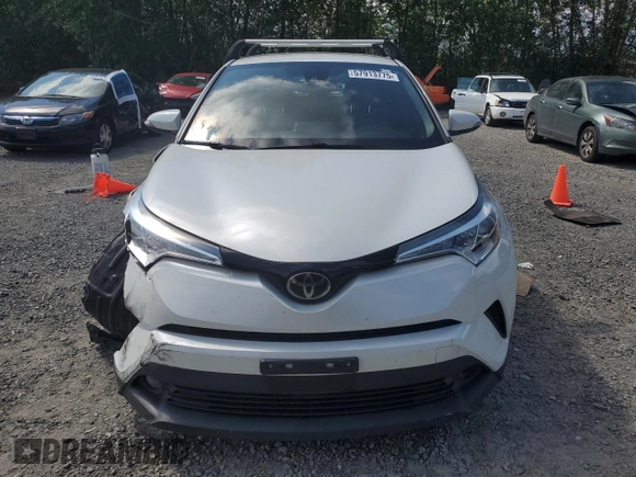 2018 Toyota C-HR XLE with VIN NMTKHMBX9JR060424, listed as a Copart auction lot 57913775 with 104,847 mi miles and Salvage title. Bid and sale history available at DreamBid. Image 5.