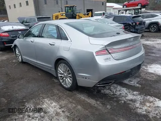 2013 Lincoln MKZ with VIN 3LN6L2J96DR800877, listed as a IAAI auction lot 41256557 with 125,584 mi miles. Bid and sale history available at carsss.com. Image 3.