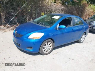 2009 Toyota Yaris with VIN JTDBT903091345311, listed as a IAAI auction lot 40269675 with 156,874 mi miles. Bid and sale history available at carsss.com. Image 2.