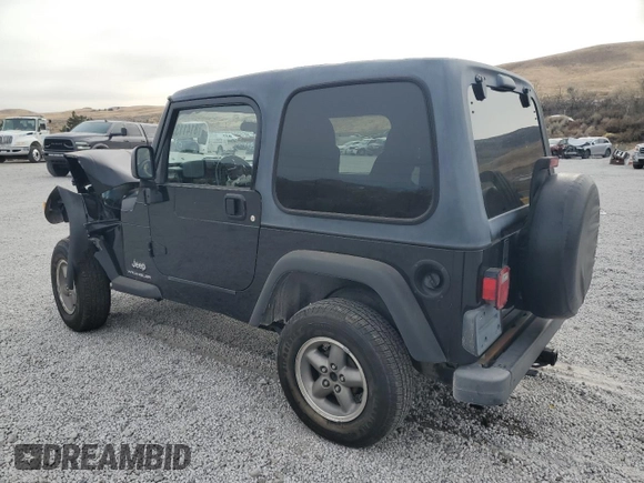 2003 Jeep Wrangler SE with VIN 1J4FA29113P351844, listed as a Copart auction lot 81411324 with 53,525 mi miles and Salvage title. Bid and sale history available at DreamBid. Image 2.