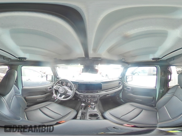 2024 Jeep Wrangler Sahara with VIN 1C4PJXEGXRW210206, listed as a Copart auction lot 58059115 with 14,492 mi miles and Salvage title. Bid and sale history available at DreamBid. Image 16.