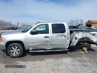 2011 GMC Sierra 1500 SLE with VIN 3GTP2VE3XBG104843, listed as a IAAI auction lot 41823410 with 162,125 mi miles and . Bid and sale history available at DreamBid. Image 14.