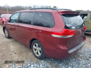2011 Toyota Sienna LE AAS with VIN 5TDKK3DC3BS034894, listed as a IAAI auction lot 41983614 with 217,308 mi miles. Bid and sale history available at carsss.com. Image 3.