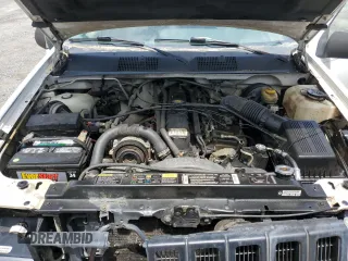 1995 Jeep Grand Cherokee Laredo с VIN 1J4GZ58S5SC724222, выставлен на аукционе Copart как лот 57837155 с пробегом 246 303 миль миль и Списание • Salvage title. История ставок и продаж доступна на DreamBid. Изображение 12.