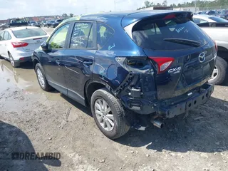 2016 Mazda CX-5 Touring with VIN JM3KE4CY0G0916908, listed as a IAAI auction lot 41848823 with 53,255 mi miles. Bid and sale history available at carsss.com. Image 3.