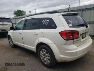 2020 Dodge Journey SE Value with VIN 3C4PDCAB6LT207097, listed as a Copart auction lot 51216705 with 140,724 mi miles and Salvage Title. Bid and sale history available at carsss.com. Image 2.