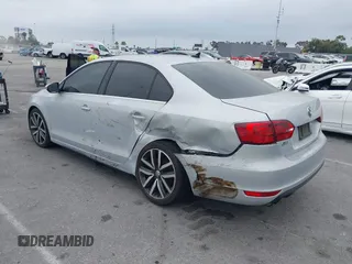 2012 Volkswagen Jetta GLI Autobahn with VIN 3VW4A7AJ1CM450205, listed as a IAAI auction lot 42421504 with 130,602 mi miles and . Bid and sale history available at DreamBid. Image 3.
