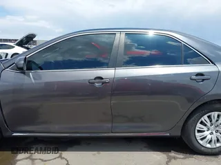 2014 Toyota Camry L with VIN 4T1BF1FK0EU853905, listed as a IAAI auction lot 42217834 with 108,612 mi miles and . Bid and sale history available at DreamBid. Image 14.