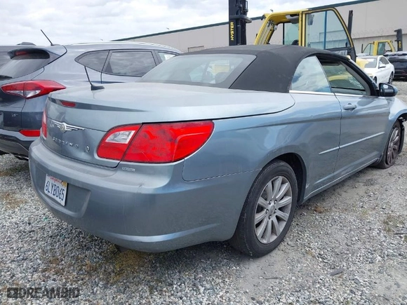 2010 Chrysler Sebring Touring with VIN 1C3BC5ED5AN187589, listed as a IAAI auction lot 42014513 with 114,044 mi miles. Bid and sale history available at carsss.com. Image 4.
