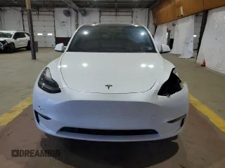 2022 Tesla Model Y Performance with VIN 7SAYGDEF7NF520825, listed as a Copart auction lot 57400245 with 55,437 mi miles and Salvage title. Bid and sale history available at DreamBid. Image 5.