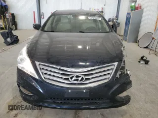 2013 Hyundai Azera z VIN KMHFG4JG1DA217528, wystawiony jako Copart lot #56123655 z przebiegiem 148 606 mil mil oraz Szkoda całkowita • Salvage title. Historia ofert i sprzedaży dostępna na DreamBid. Obrazek 5.