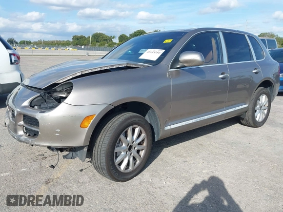 2005 Porsche Cayenne S with VIN WP1AB29P75LA61263, listed as a IAAI auction lot 41635350 with 242,874 mi miles. Bid and sale history available at carsss.com. Image 18.