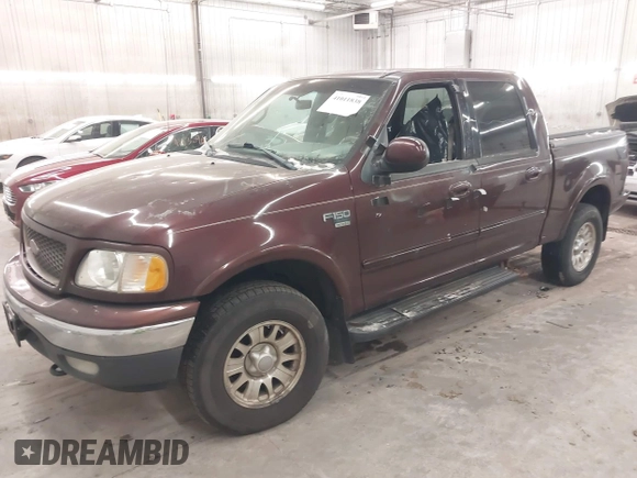 2001 Ford F-150 XLT with VIN 1FTRW08L51KE26356, listed as a IAAI auction lot 41011838 with Not provided miles and . Bid and sale history available at DreamBid. Image 2.