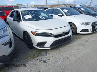 2024 Honda Civic Sport z VIN 2HGFE2F59RH557235, wystawiony jako IAAI lot #41662116 z przebiegiem 15 130 mil mil oraz . Historia ofert i sprzedaży dostępna na DreamBid. Obrazek 1.