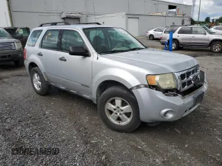 2008 Ford Escape XLS z VIN 1FMCU02Z88KB09430, wystawiony jako Copart lot #58158645 z przebiegiem 216 763 mil mil oraz Czysty tytuł • Clean title. Historia ofert i sprzedaży dostępna na DreamBid. Obrazek 4.