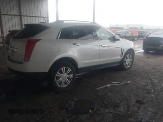 2014 Cadillac SRX z VIN 3GYFNAE32ES580480, wystawiony jako IAAI lot #42170765 z przebiegiem 148 245 mil mil oraz . Historia ofert i sprzedaży dostępna na DreamBid. Obrazek 4.