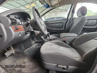 2002 Dodge Stratus SE z VIN 1B3EL36R02N198011, wystawiony jako Copart lot #58213505 z przebiegiem 104 464 mil mil oraz Tytuł czysty. Historia ofert i sprzedaży dostępna na DreamBid. Obrazek 7.