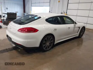 2016 Porsche Panamera 4 z VIN WP0AA2A71GL000087, wystawiony jako IAAI lot #41435476 z przebiegiem 103 537 mil mil oraz . Historia ofert i sprzedaży dostępna na DreamBid. Obrazek 4.